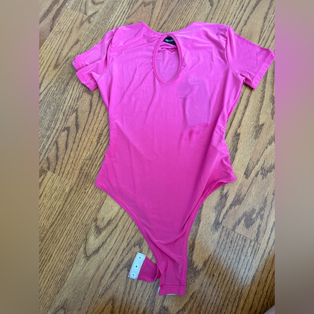 NWT Pretty Little Thing pink bodysuit.